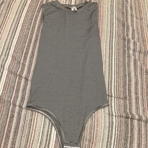 prime cut, stretchy bodysuit, striped black and white, one size.
